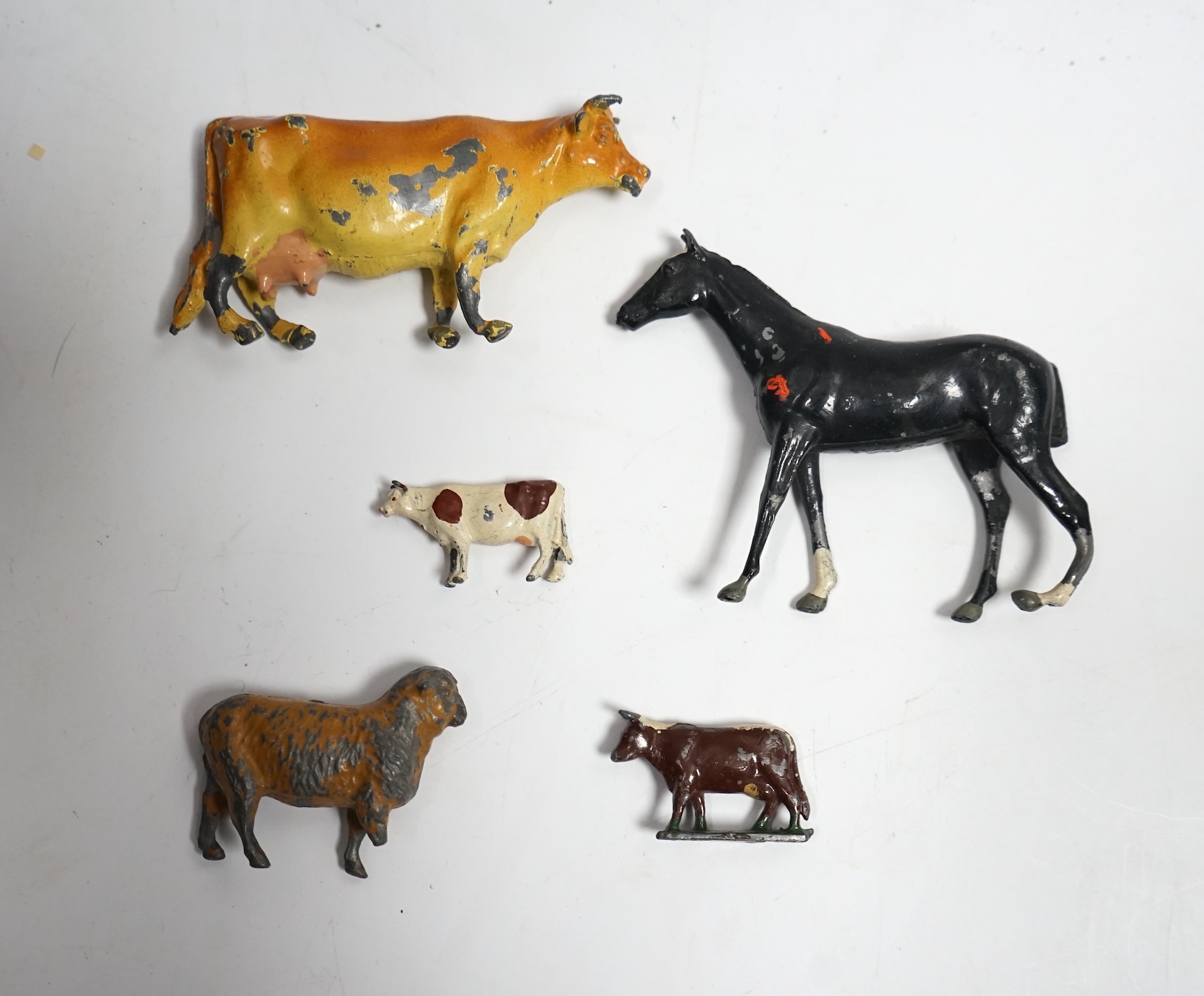 A collection of Britains, etc. lead figures, farm animals and other items. Condition - poor.